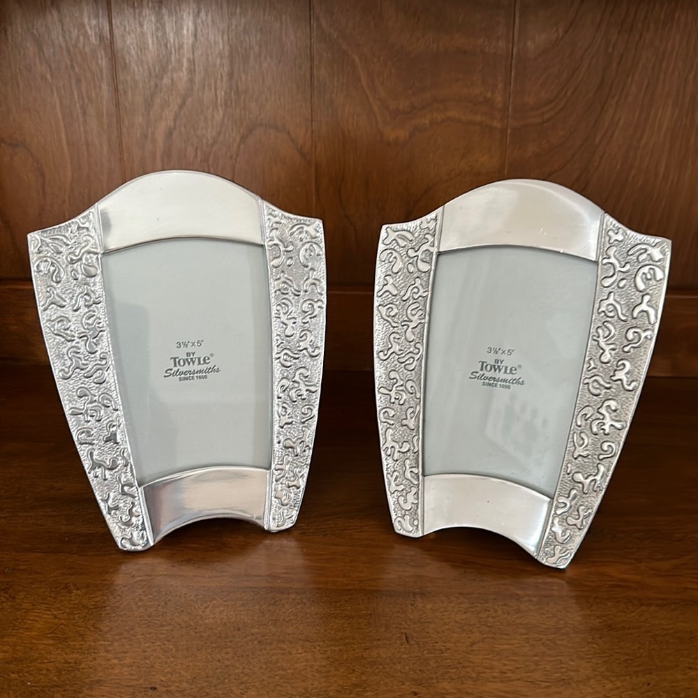 Towle Silversmiths picture frames.